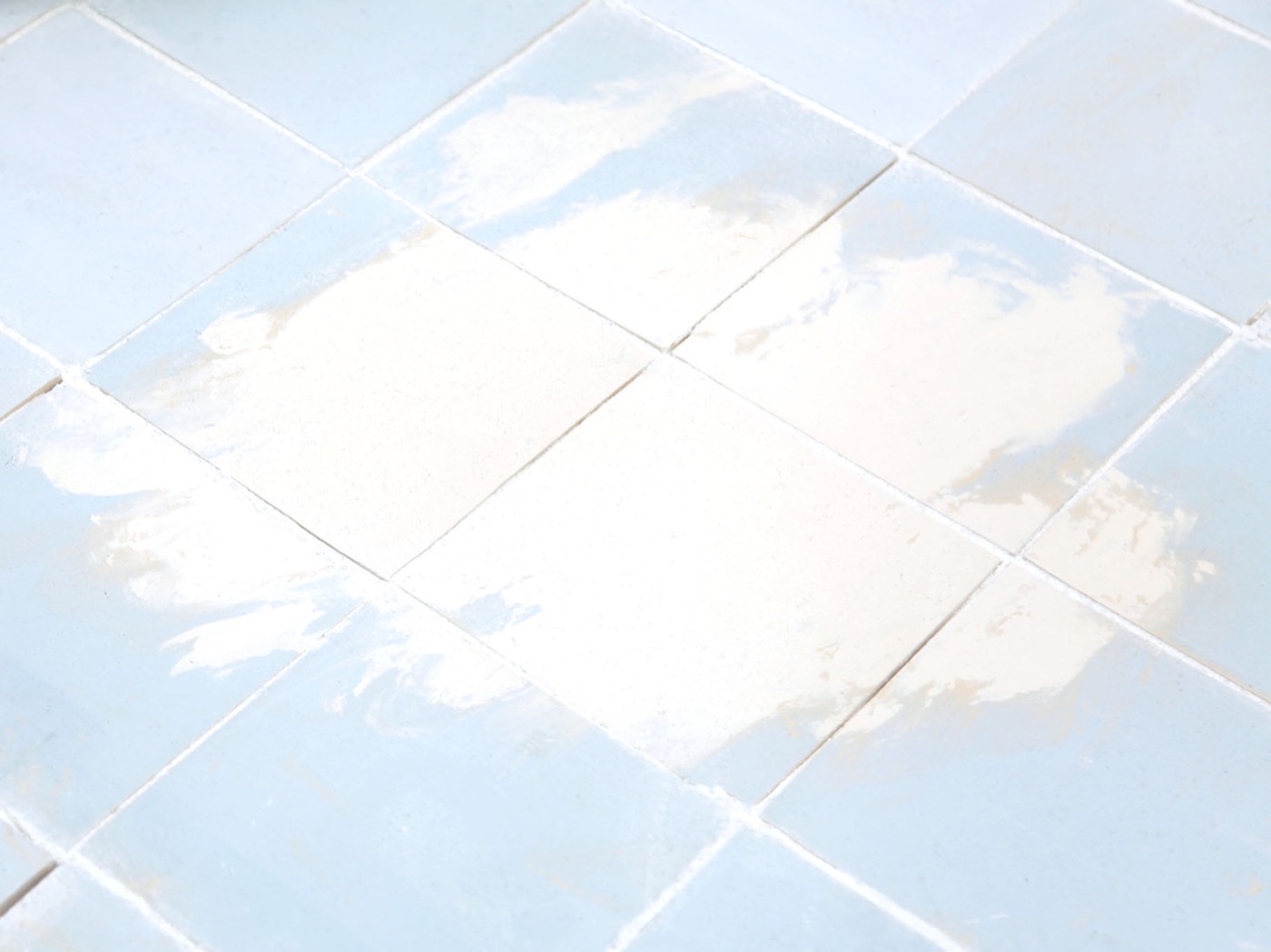 Detail of Ylva Katarina Lindh's handmade ceramic cloud tiles