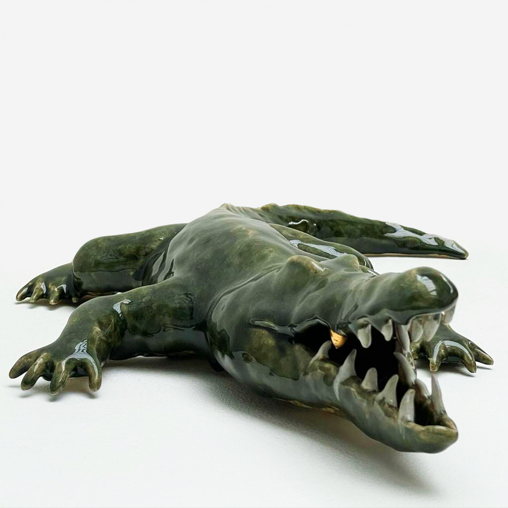 Beskyddare, reduction-fired glazed stoneware with gold