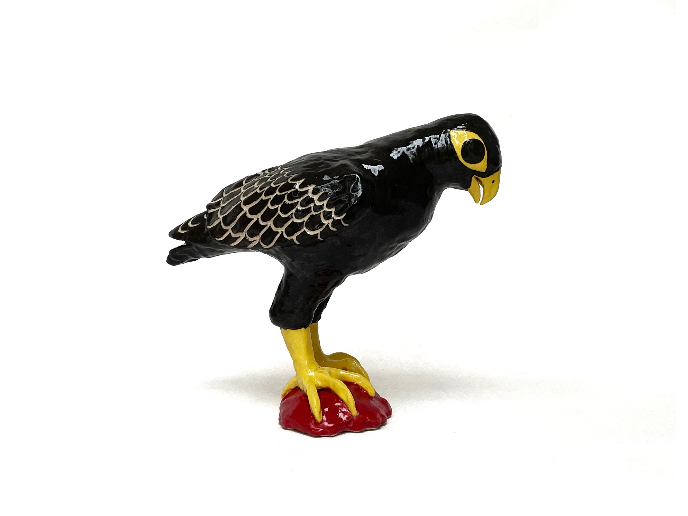 Falcon, a glazed stoneware bird sculpture